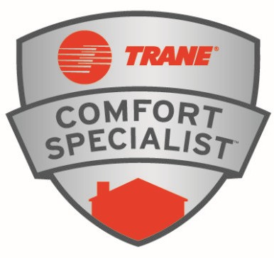 Trane Comfort Specialist badge featuring the Trane logo, indicating Mann Plumbing & Heating’s certification as a Trane Comfort Specialist.